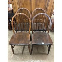 A set of four beech kitchen chairs