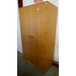 A Meredew teak wardrobe