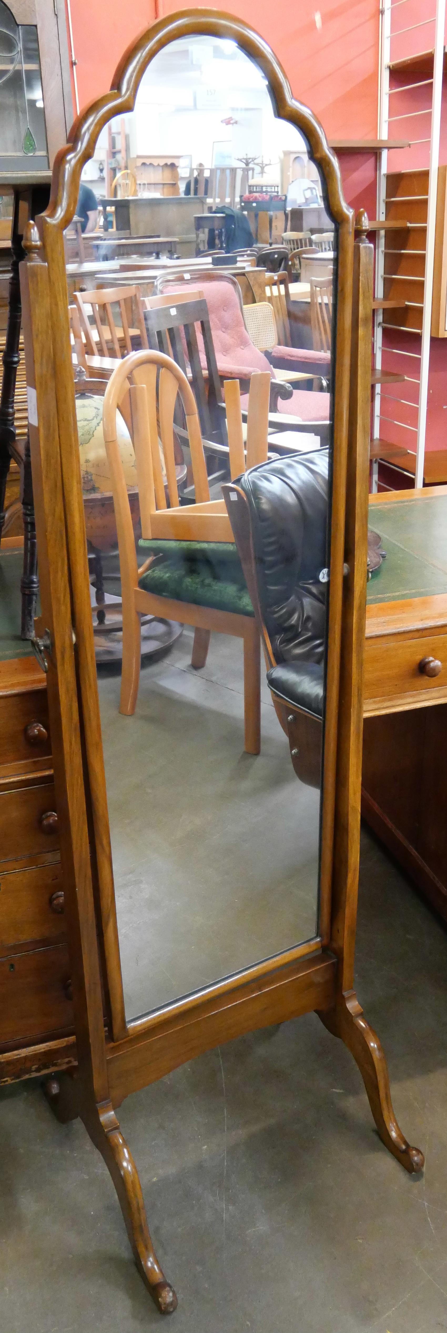 A Queen Anne style walnut cheval mirror