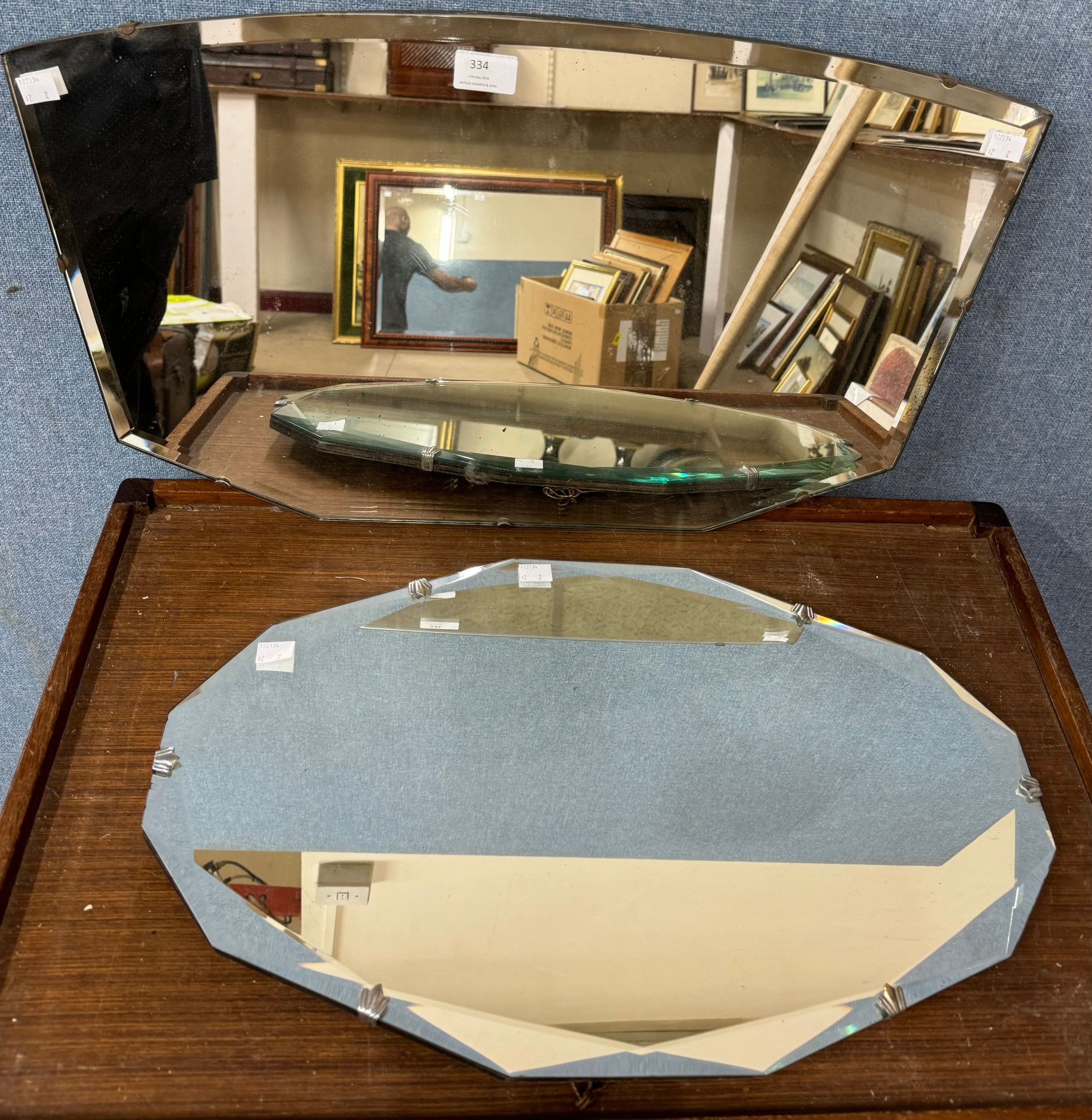 Two bevelled edge mirrors