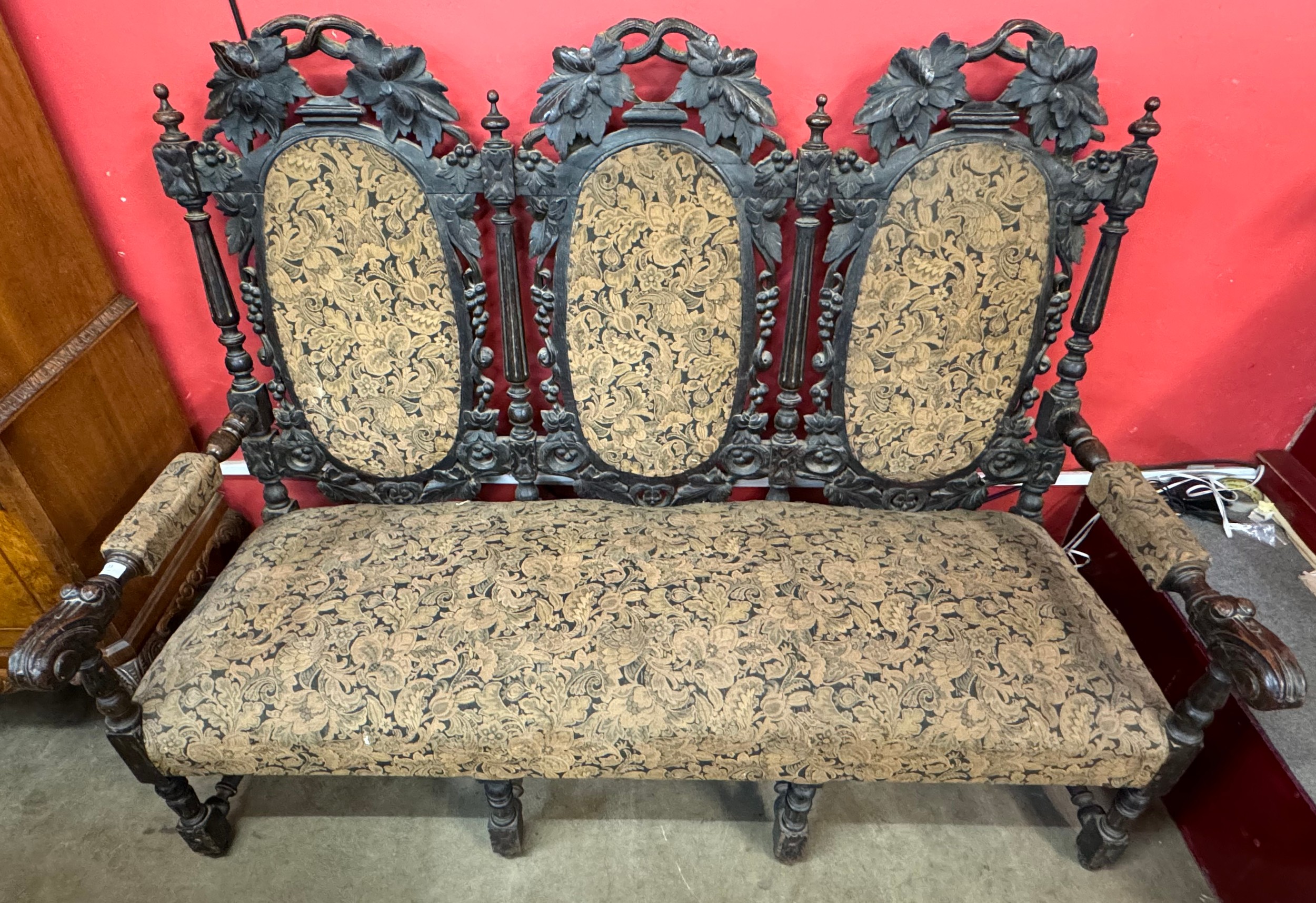 A Victorian Jacobean Revival carved oak settee/sofa - Image 2 of 2