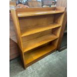 A teak open bookcase