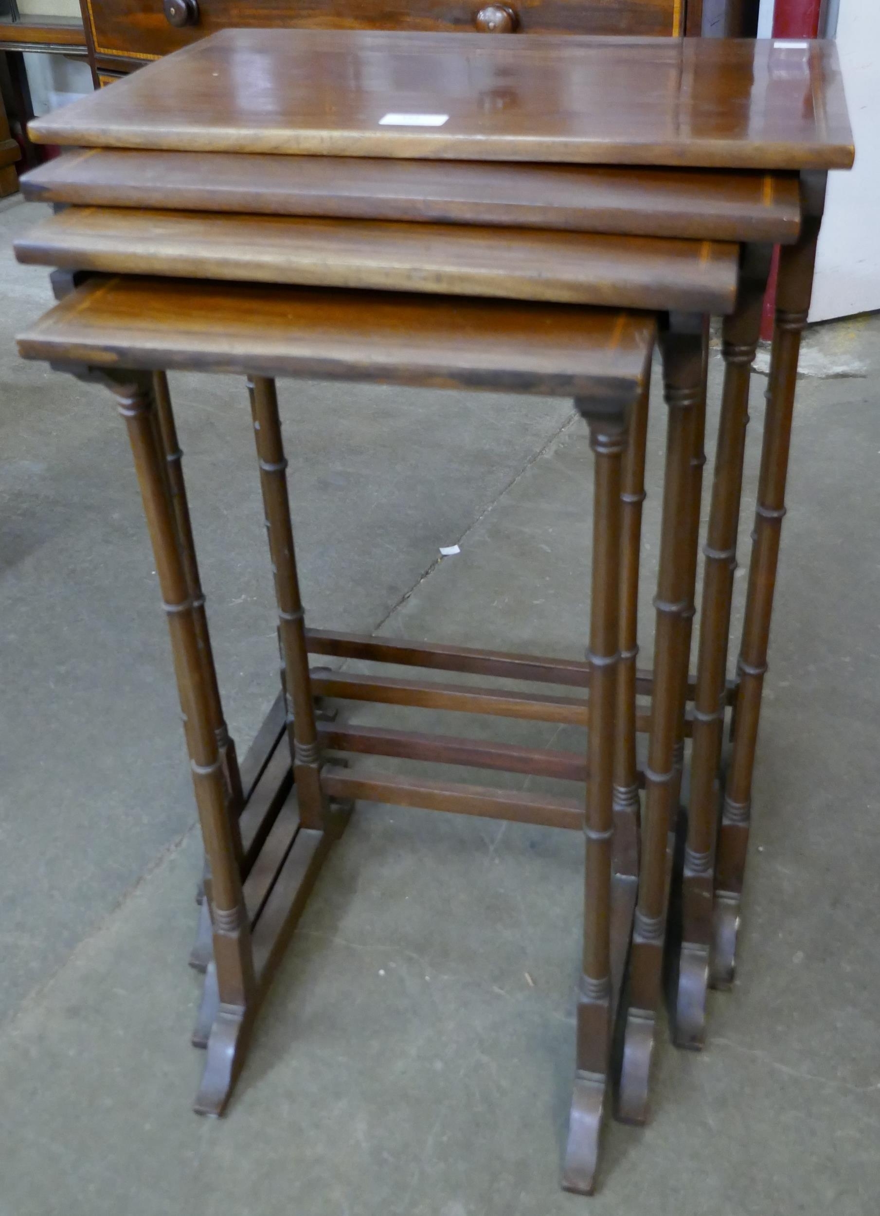 An Edward VII inlaid mahogany nest of quartetto tables