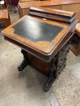 A Victorian inlaid walnut Davenport