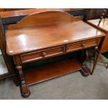 A Victorian mahogany two drawer side table