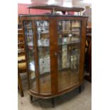 A walnut cocktail cabinet