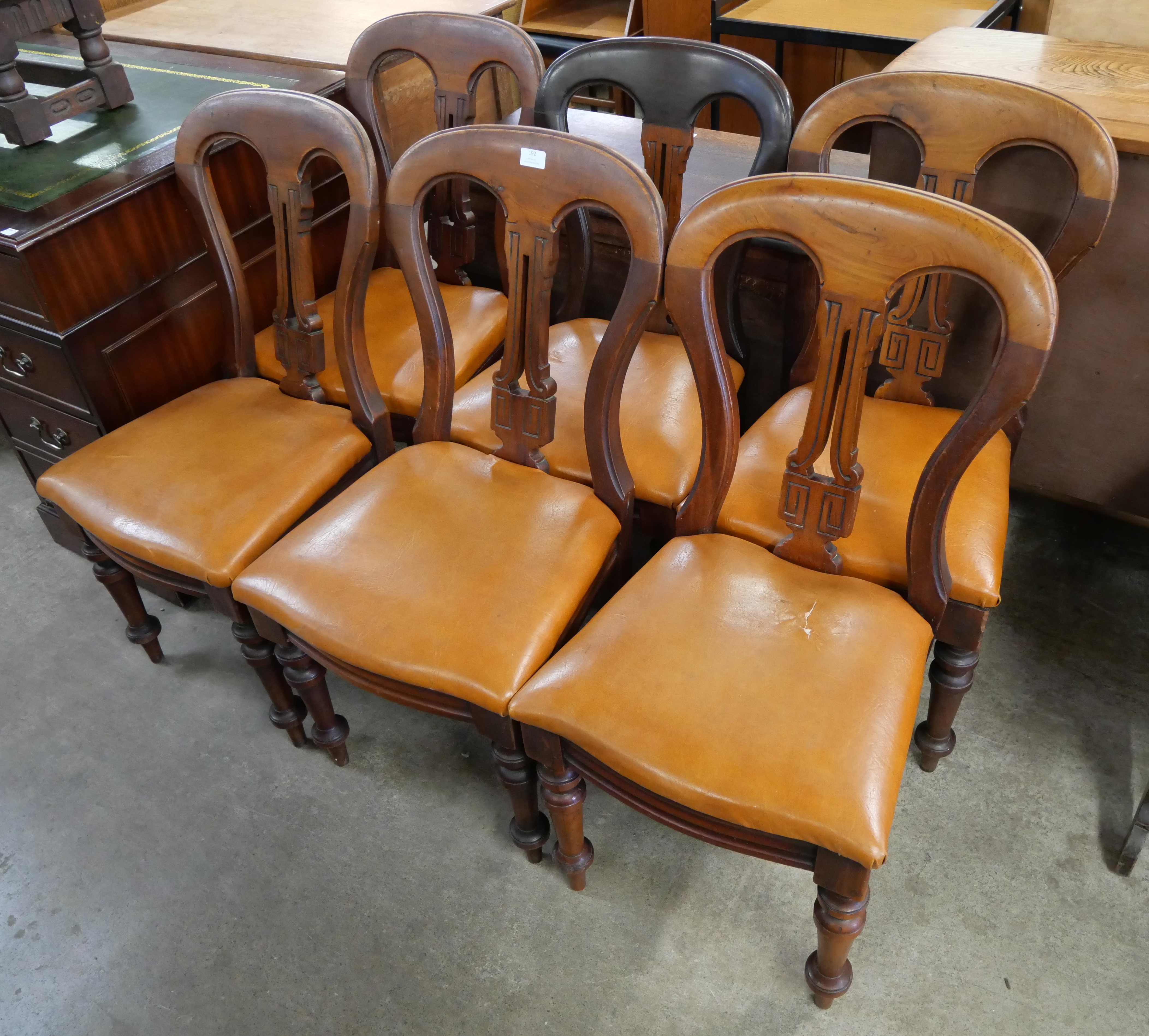 A set of six Victorian mahogany dining chairs