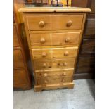 A small pine chest of drawers