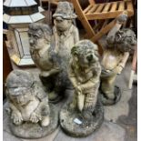A set of five concrete garden figures of cricketers