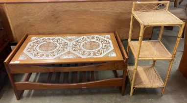 A teak and tiled topped coffee table and a bamboo and rattan three tier whatnot