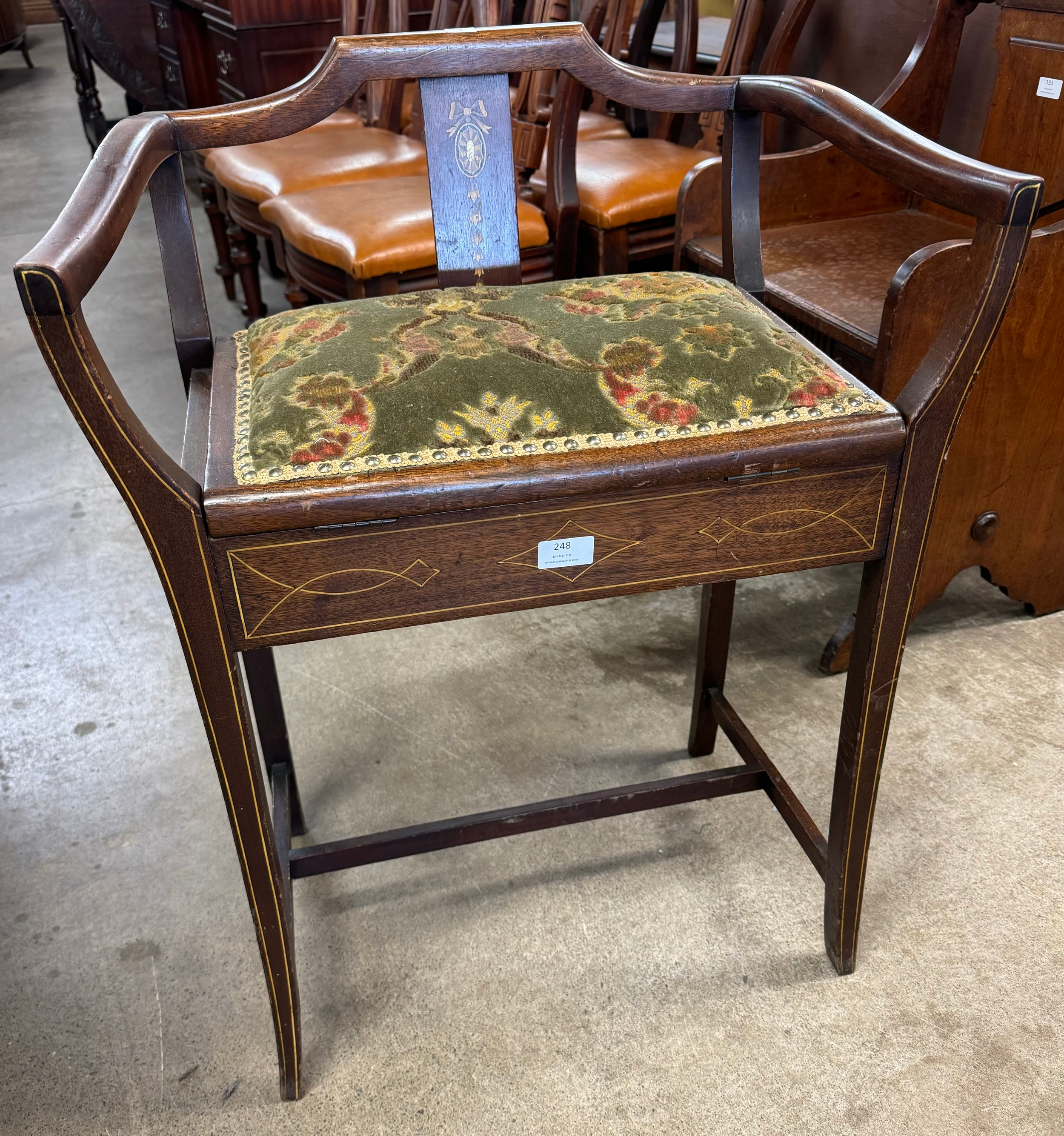 An Edward VII inlaid mahogany piano stool