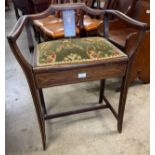 An Edward VII inlaid mahogany piano stool