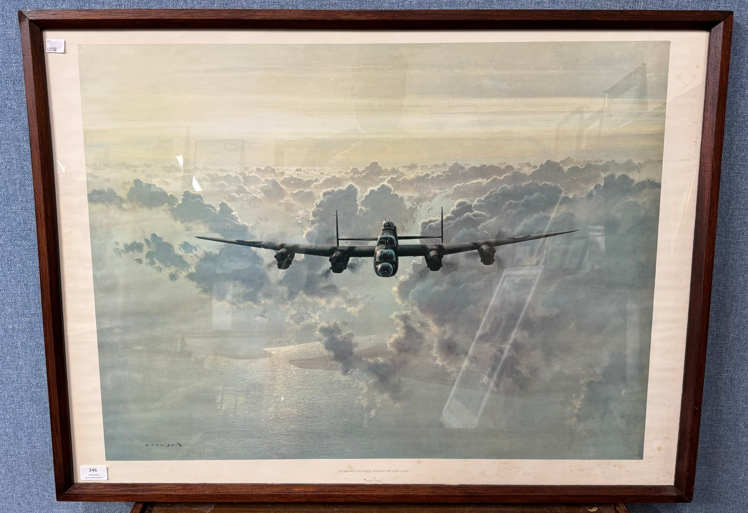 A Gerald Coulson print, Outbound Lancaster Crossing The East Coast, framed