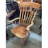 A Victorian beech farmhouse rocking chair