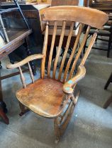 A Victorian beech farmhouse rocking chair