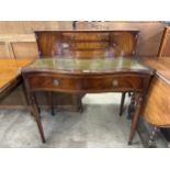 A Regency style mahogany and green leather topped bonheur de jour