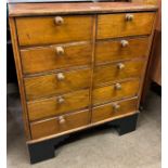 An early 20th Century pine ten drawers watchmaker's chest