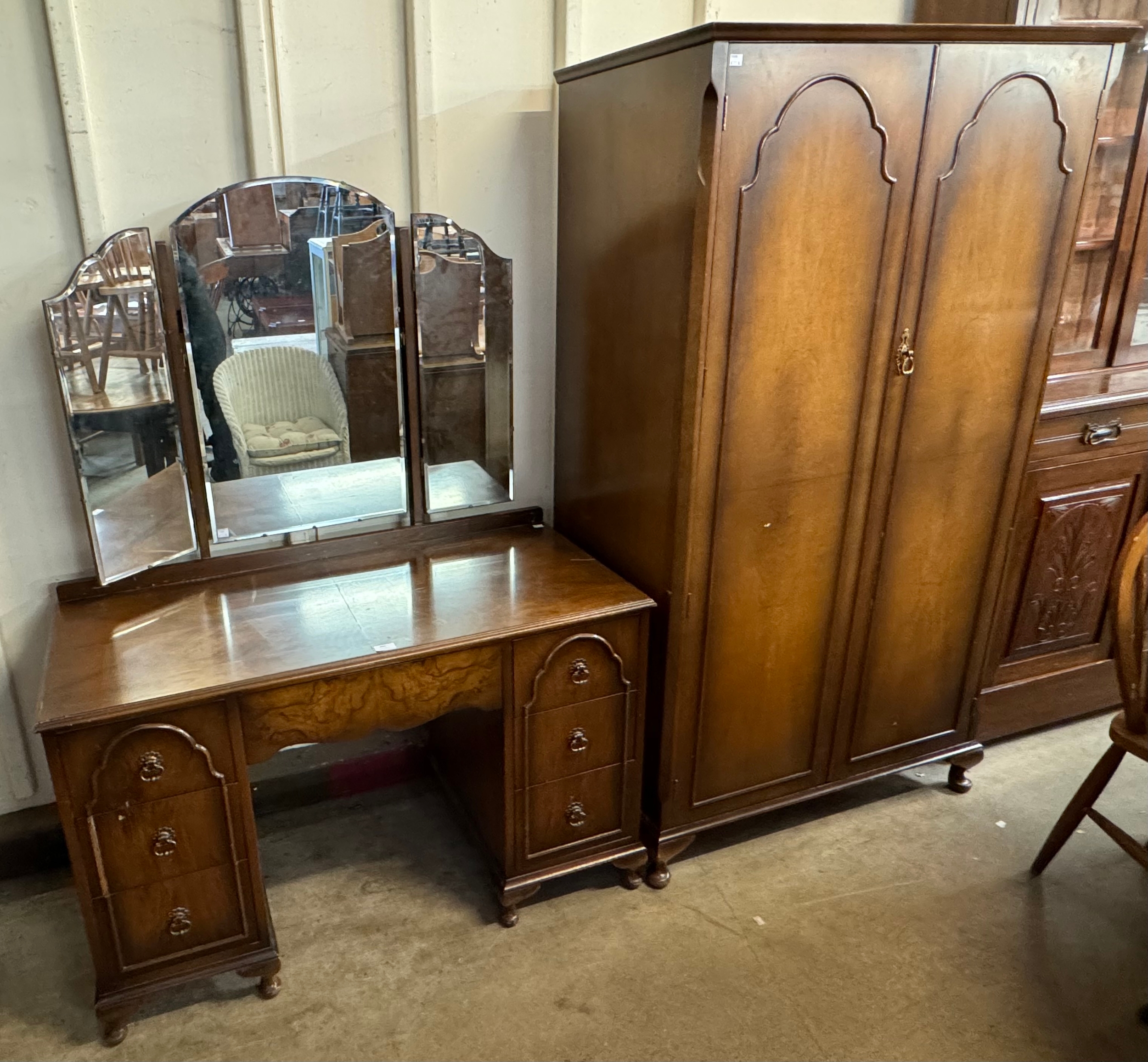 A wardrobe and dressing table suite