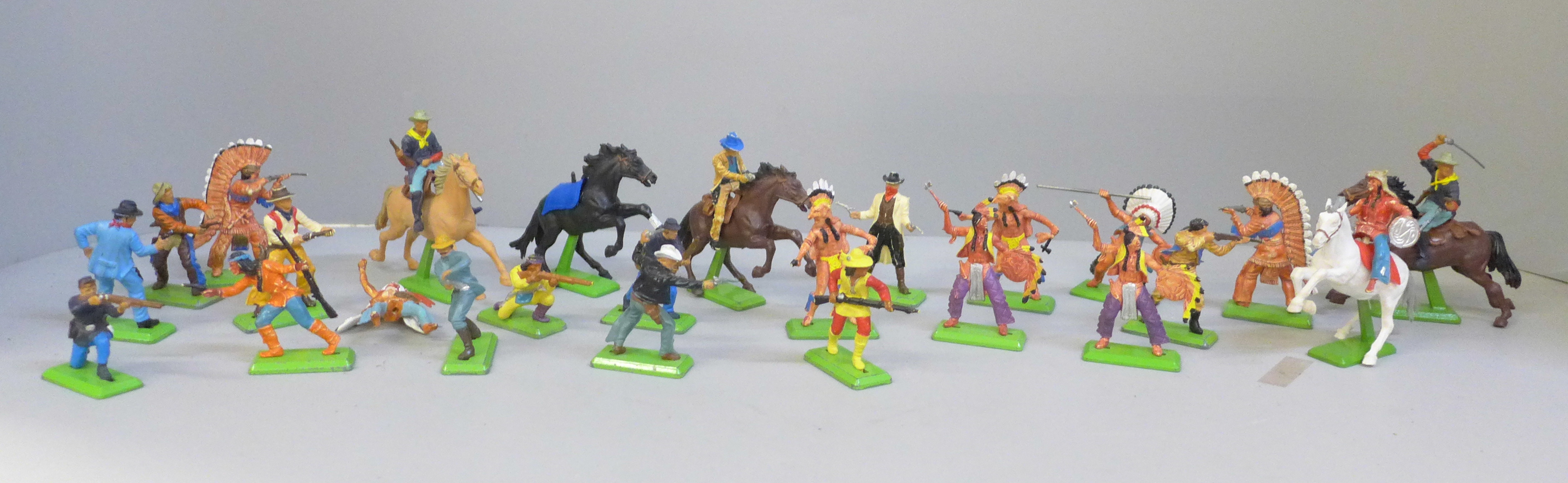 A collection of Britains Deetail figures, 25 including some on horseback