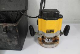 A pre-owned DeWalt DW625EL-XW Router.