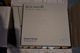 Nine boxed Bucanim smart scales.
