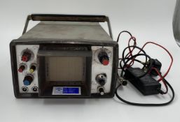 A pre-owned Krautkramer USM2 Ultrasonic Flaw Detector with battery and charger (Does not power on. S