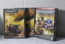 Two Warhammer 40,000 Ork Trucks and a Warhammer 40,000 recruit edition starter kit (Boxes Sealed).