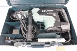 A Hitachi Hikoki DH52ME Brushless Rotary Hammer Drill 230V 1500W - Pre-Owned.