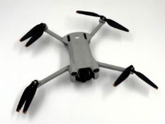A pre-owned DJI Mini 3 Pro Drone with battery pack (Untested, sold as seen).