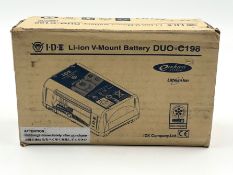 A boxed as new IDX DUO-C198 High Load Li-Ion V-Mount Battery (Some damage to box).