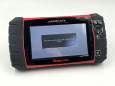 A pre-owned Snap-on Modis Ultra EEMS328 Diagnostic Scanner with hard case (Powers on, not tested fur