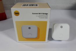 Yale Connect Wi-Fi Bridge - AC-R1 and a Yale Connect G Plug - 020-00163.