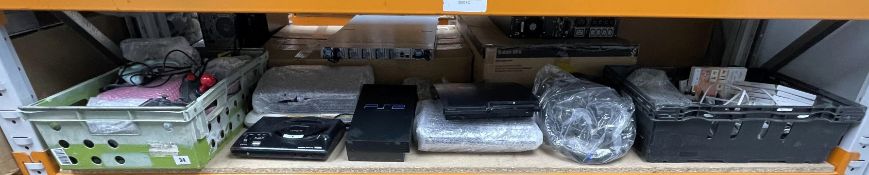 A quantity of pre-owned game consoles and related items (All items sold as seen).