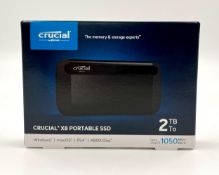 A boxed as new Crucial 2TB X8 Portable SSD (Box sealed) (EAN: 649528900609).
