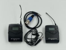 Two pre-owned Sennheiser SK 100 G3 Bodypack Transmitters, a clip-on mic and cables in a storage pouc
