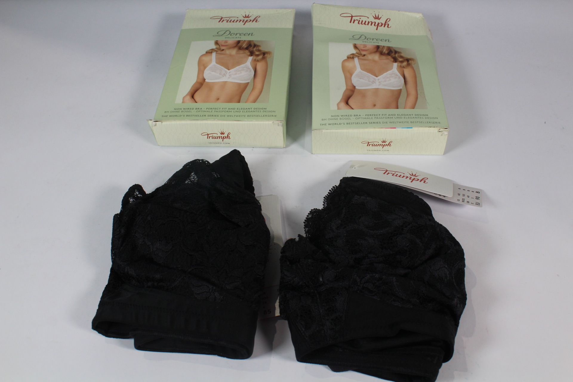 Two Doreen Delicate Non Wired Black Bras Sizes 1 x 38 DD, 1 X 40 B, Boxes Damaged.