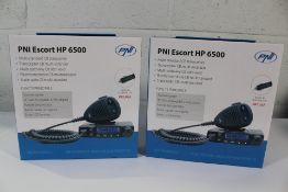 Two PNI Escort HP 6500 Multi-Standard CB Transceivers.