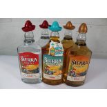 Five Sierra Tequila 1000ml: Two Blanco, Two Reposado and One Tropical Chilli (Some hats damaged).