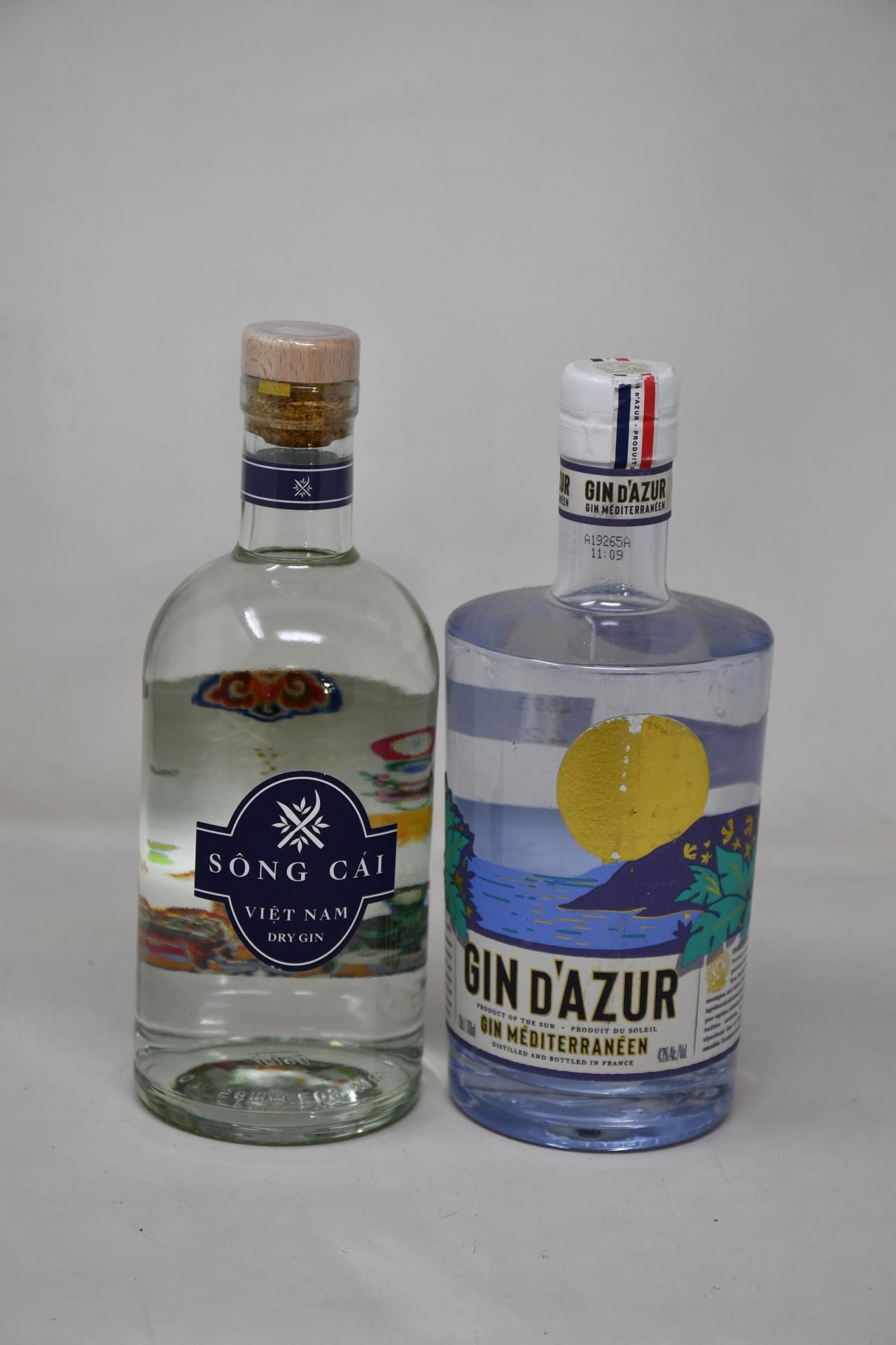 Two bottles of Song Cai Vietnam Dry Gin (700ml) and a bottle of Gin D'Azur Mediterraneen Gin (700ml)