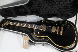 Orville by Gibson Les Paul Custom Electric Guitar - Black and Gold. Pre-Owned.