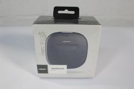 Bose SoundLink Micro Bluetooth Speaker in Dark Blue.
