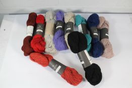 Fifty Isager Tvinni Yarns: Colours 6s, 26, 32, 54, 25, 2s, 33s, 61s, 30 and 28s - 5 of each.