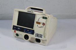 Medtronic Lifepak 20e Defibrillator/Monitor. Pre-owned. Item is untested and may be incomplete. View