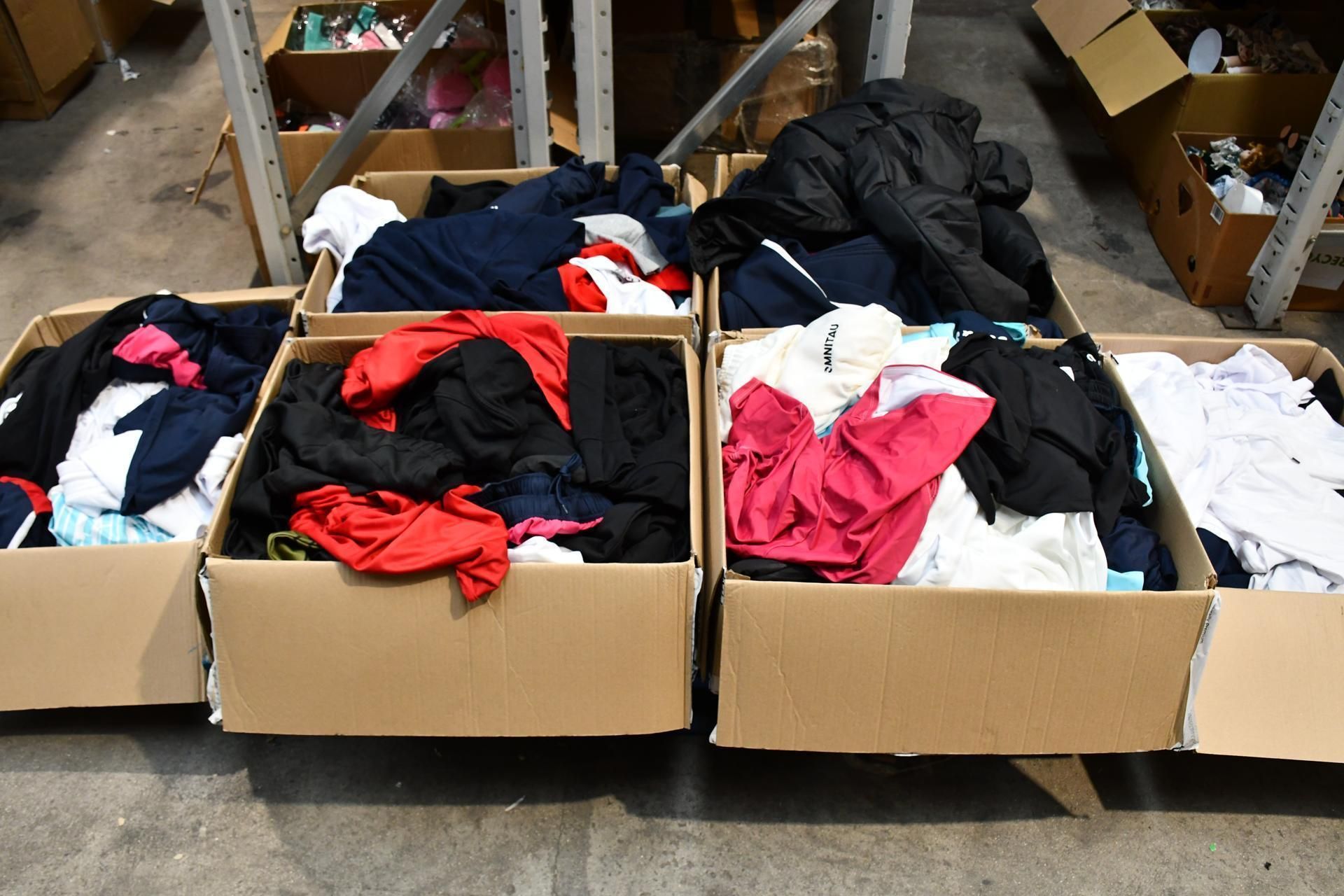 Six Boxes of Assorted Sportswear including Coats, T-Shirts, Shorts, Polos, Jumpers, Various Colours