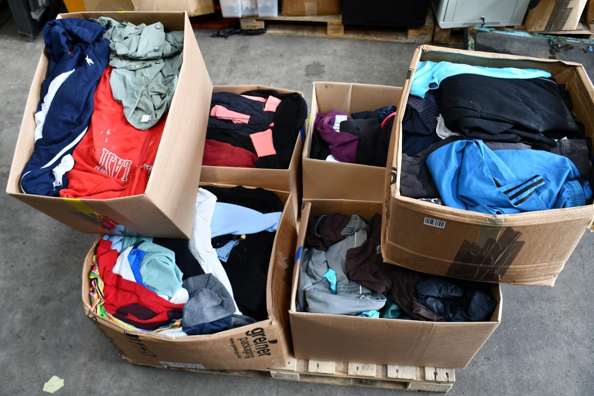 Six Boxes of Pre-Owned Clothing and Related Items.