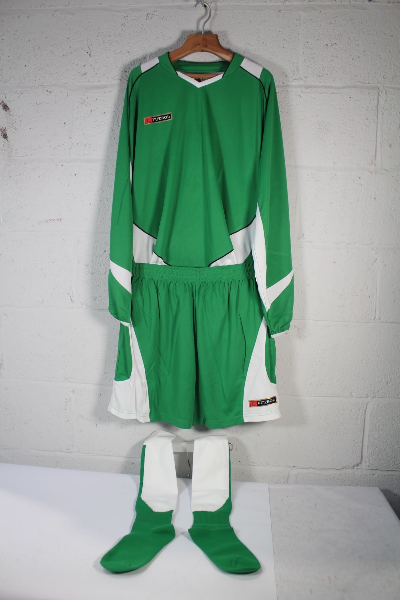 Pallet Containing Two Hundred and Fifty Sunday League Football Kits in Green, White and Black (Assor