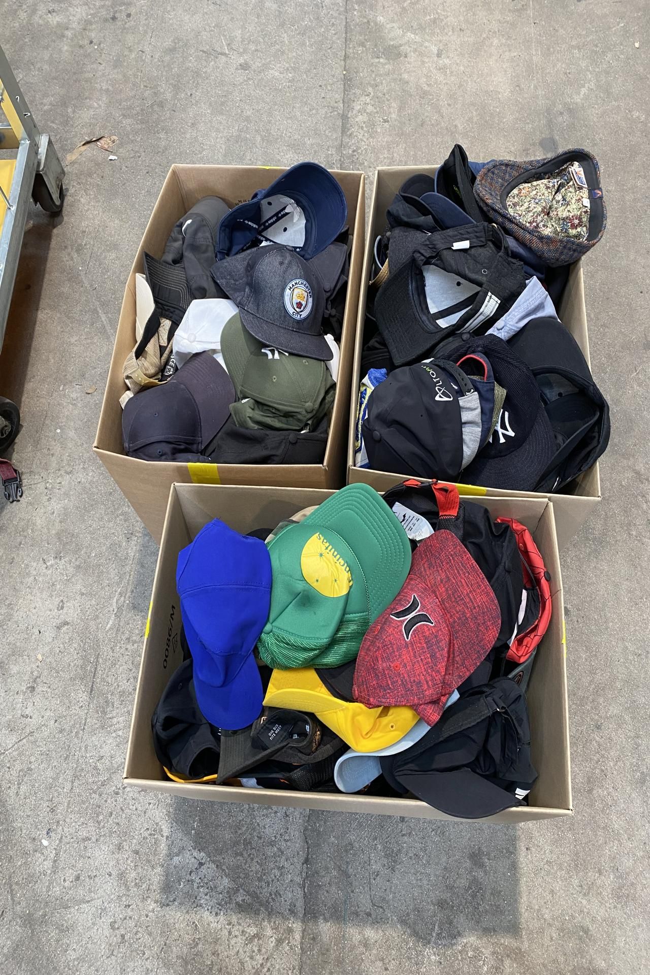 Three Boxes of Assorted Hats/Caps. All Pre-owned.