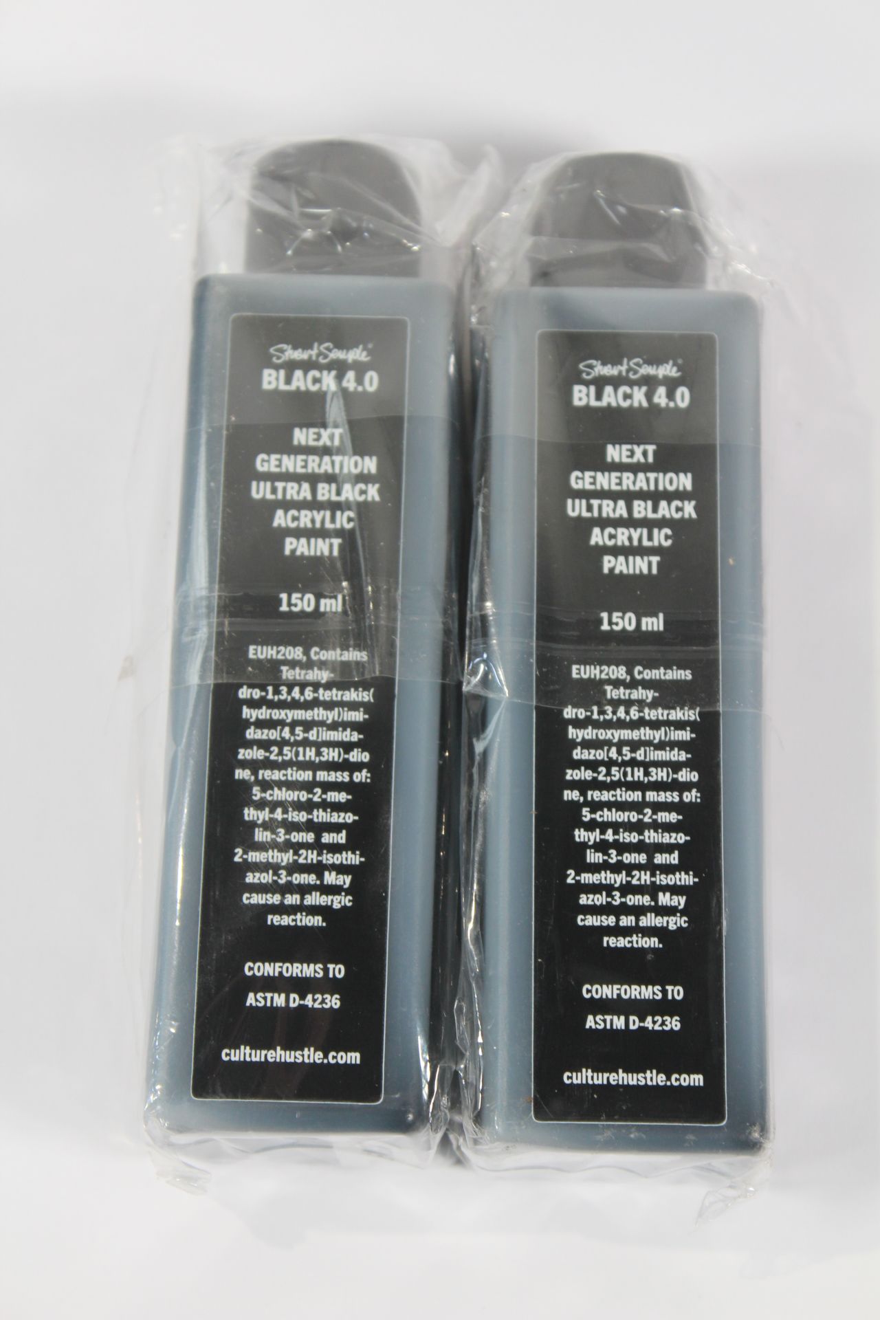 Two Bottles of Black 4.0 150ml. As New (No Box).