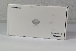A Medtronic Guardian 4 Transmitter Kit, REF MMT-7840W1. As New and Sealed.
