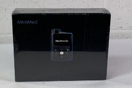 A Medtronic MiniMed 780G Insulin Pump, REF: MMT-1895WW, EXP: 2026-05-03. As New and Sealed.